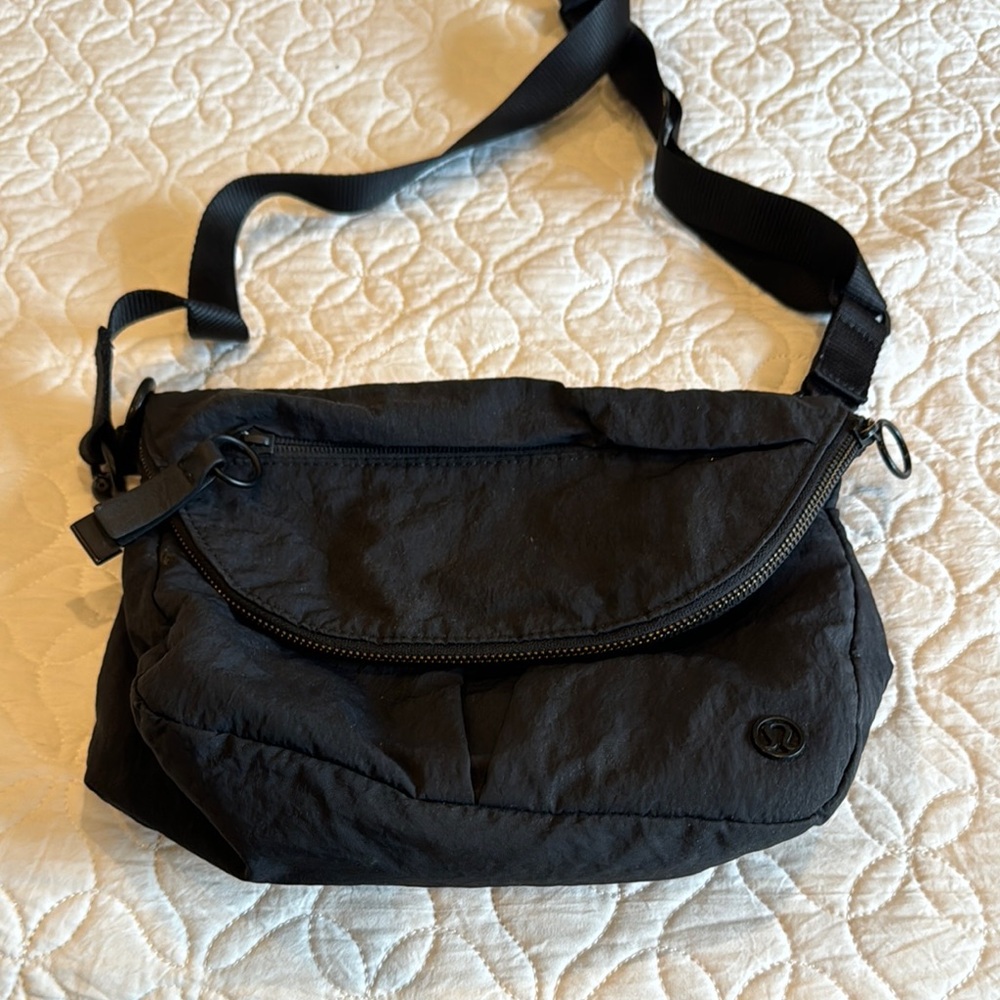 Black Crossbody Bag with Adjustable Strap and Durable Fabric